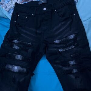 AMIRI Black Ripped Denim Jeans